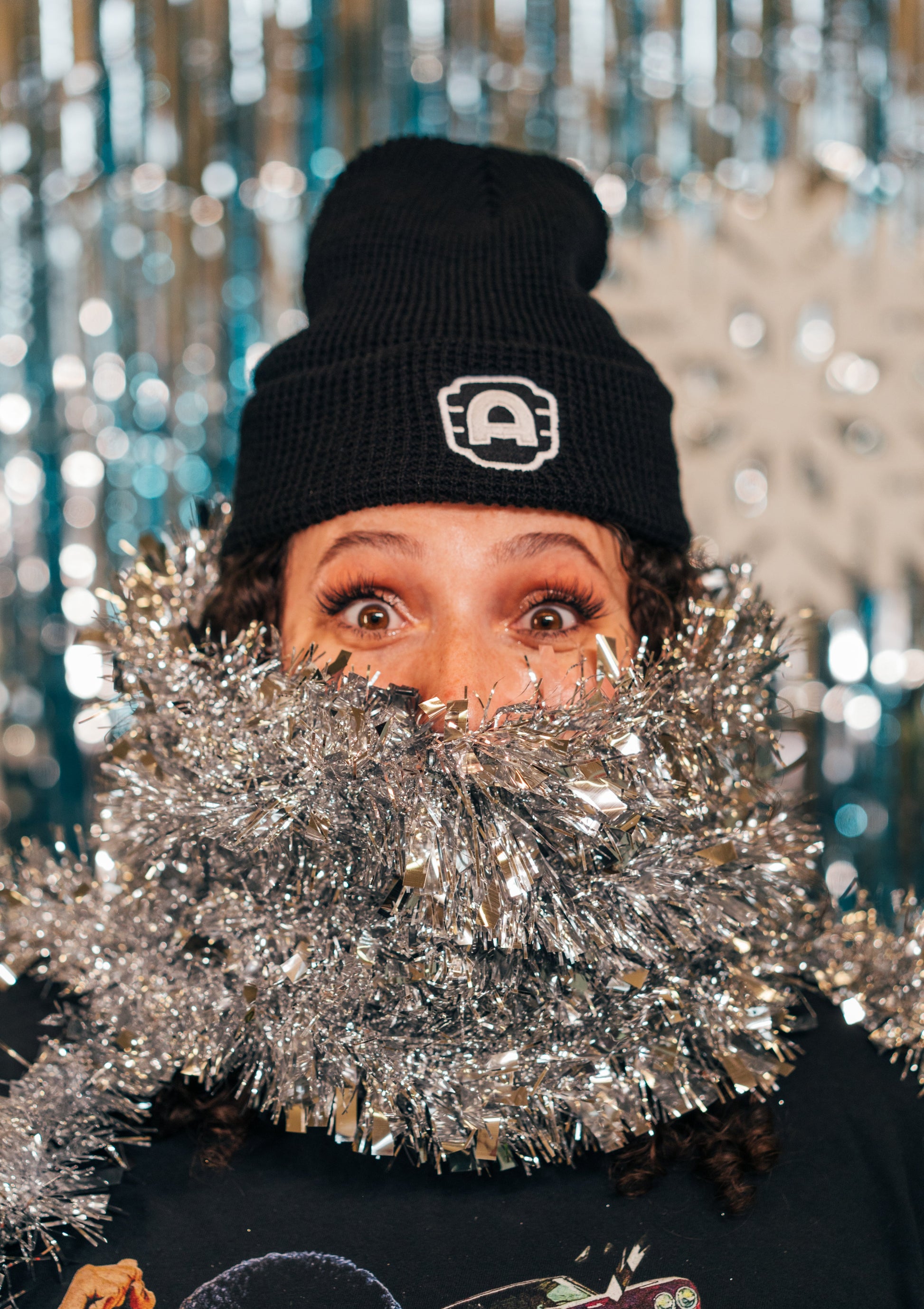 woman wearing Alamo Drafthouse Waffle Cuff Beanie