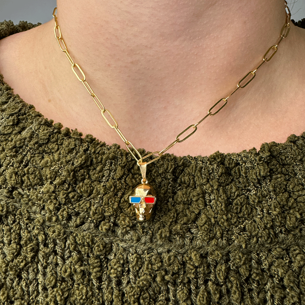 woman wearing Alamo Drafthouse 3D Skull Charm