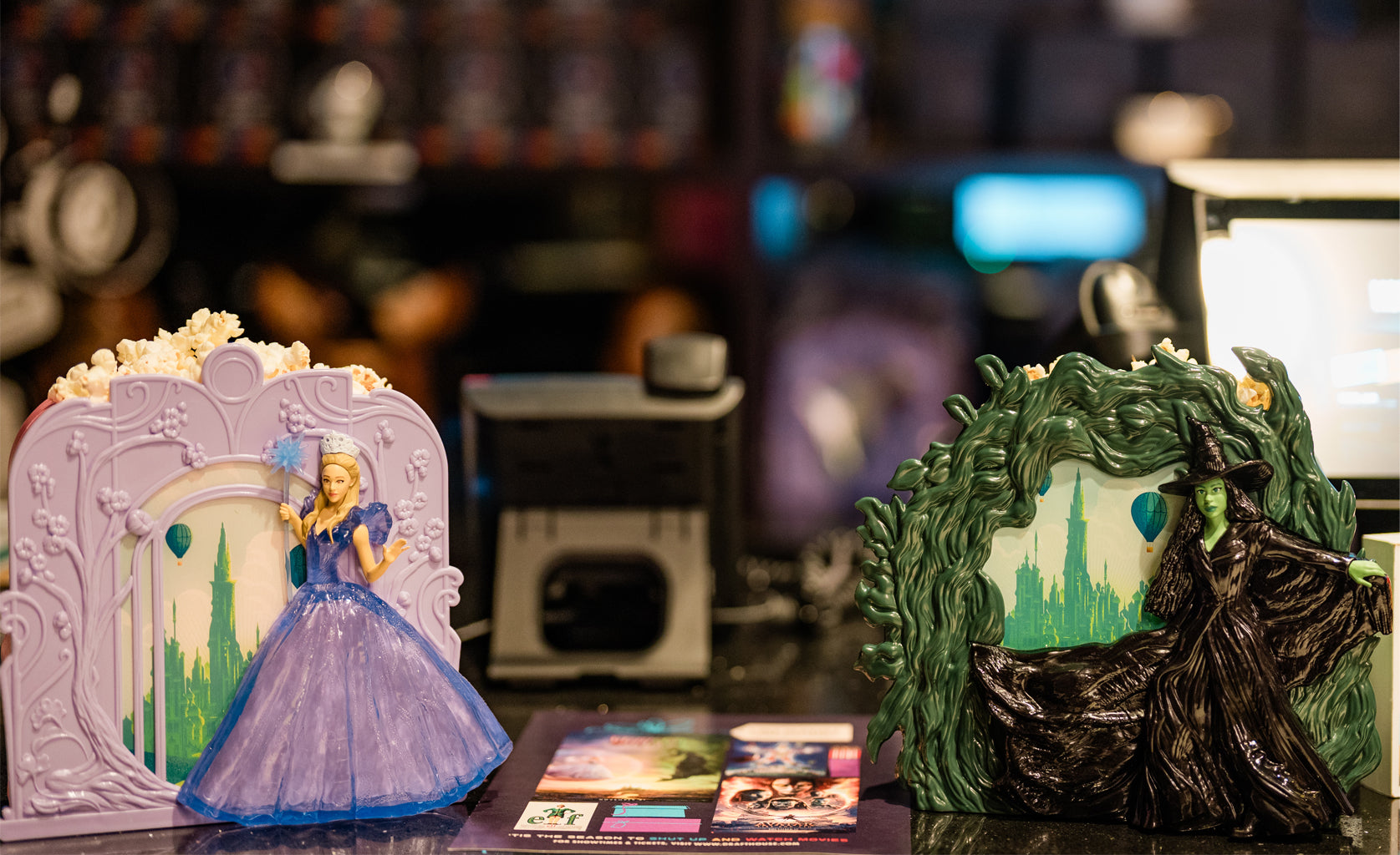 WICKED: FOR GOOD Elphaba and Glinda Popcorn Buckets on display at the box office