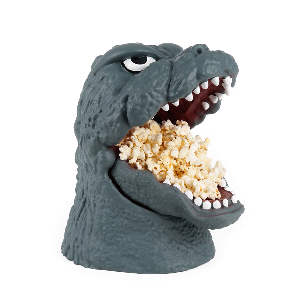 angled view of Godzilla Popcorn Bucket filled with popcorn