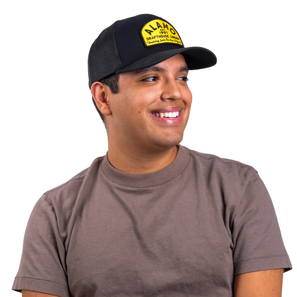 man wearing Professional Shusher Trucker Hat