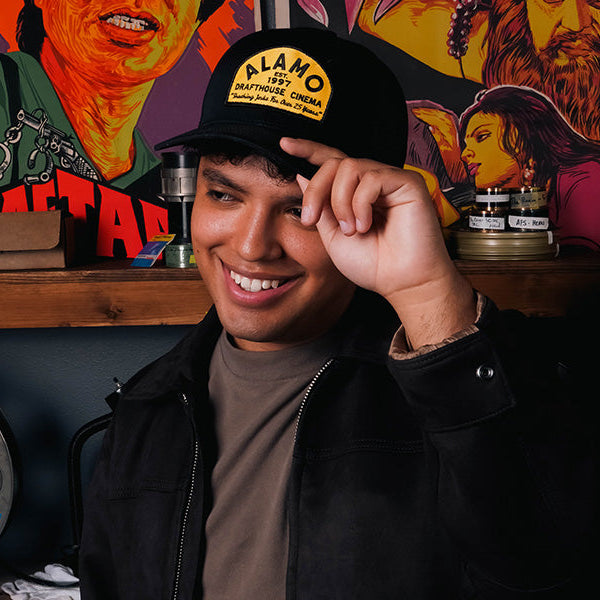 man wearing Professional Shusher Trucker Hat