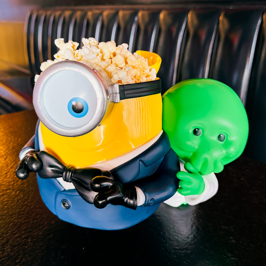 MINIONS & MONSTERS Popcorn Bucket filled with popcorn