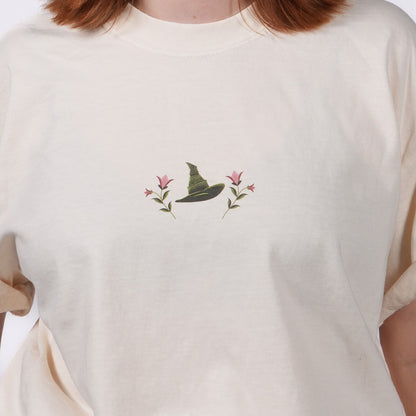 close-up of design on the front of the WICKED: FOR GOOD T-Shirt in Ivory