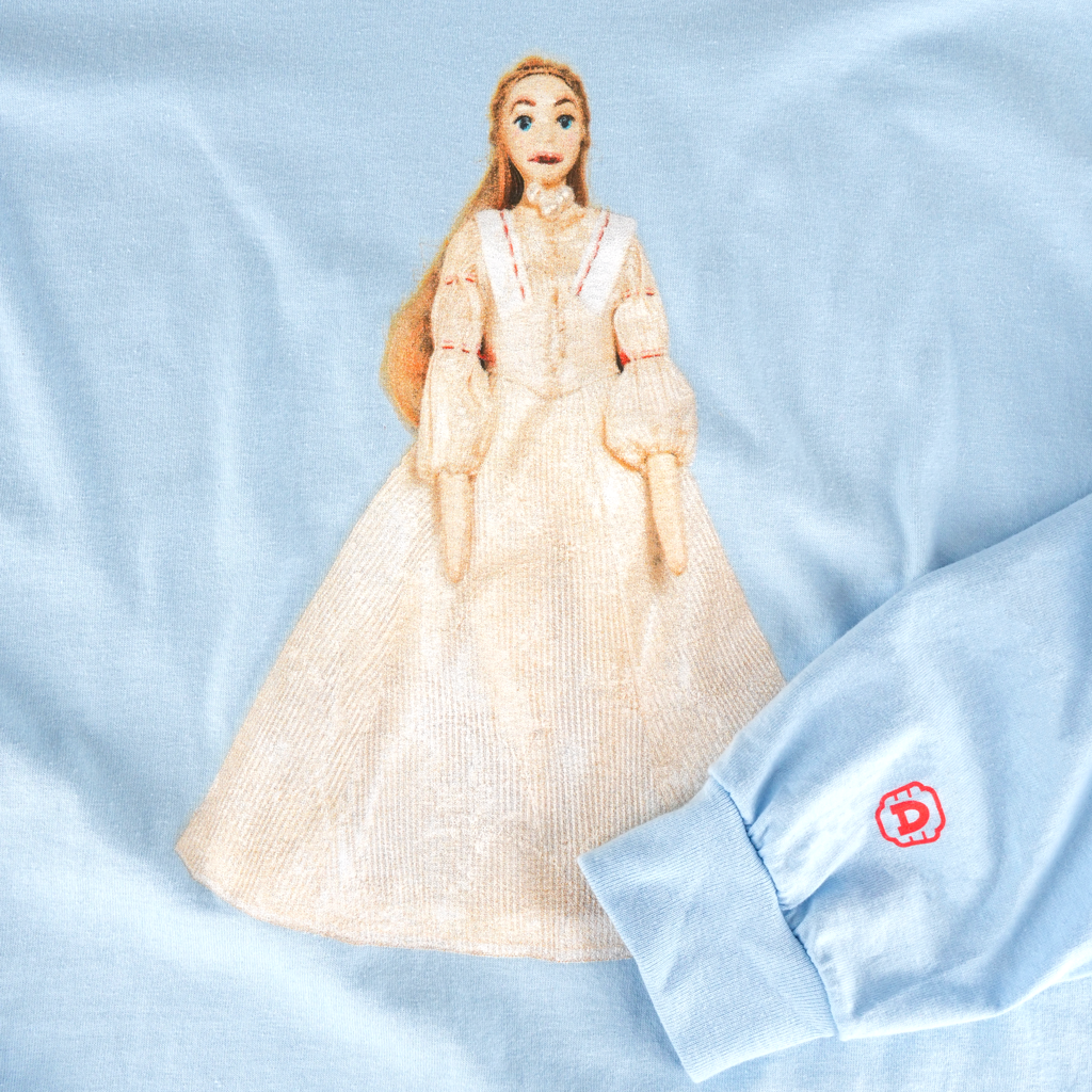 close-up of the Cathy doll design on the front of the WUTHERING HEIGHTS shirt